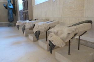 Gargoyles choked with lead from burnt-off roof, preserved in Palace of Tau museum